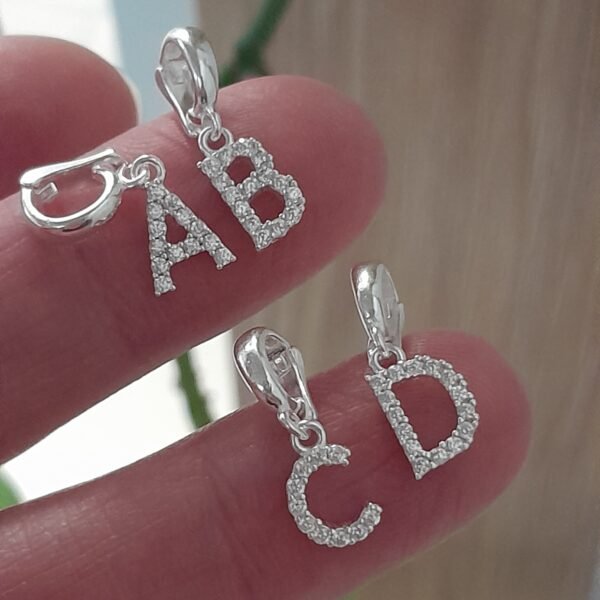 Dije iniciales - Laminados