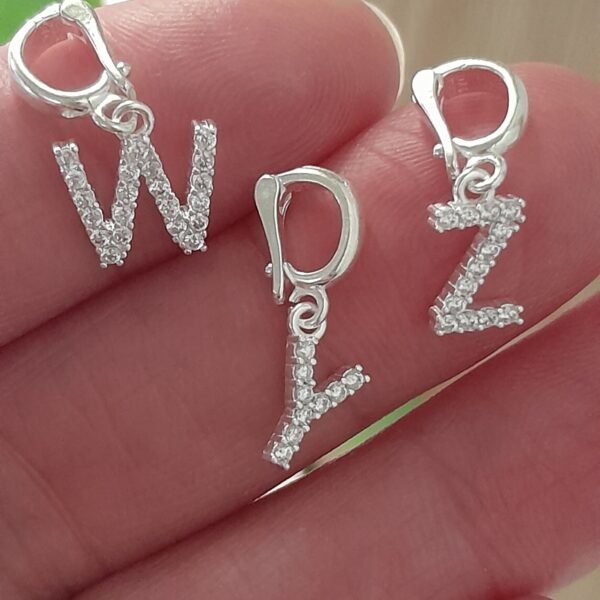 Dije iniciales - Laminados