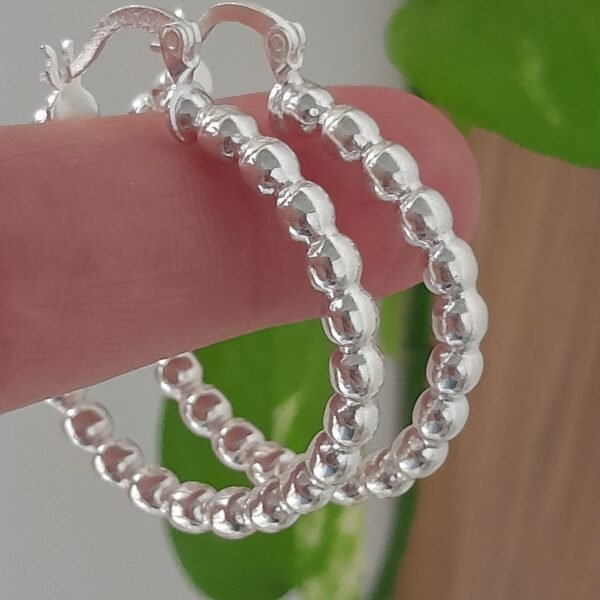 Aros huggies bolitas rosario – Laminados