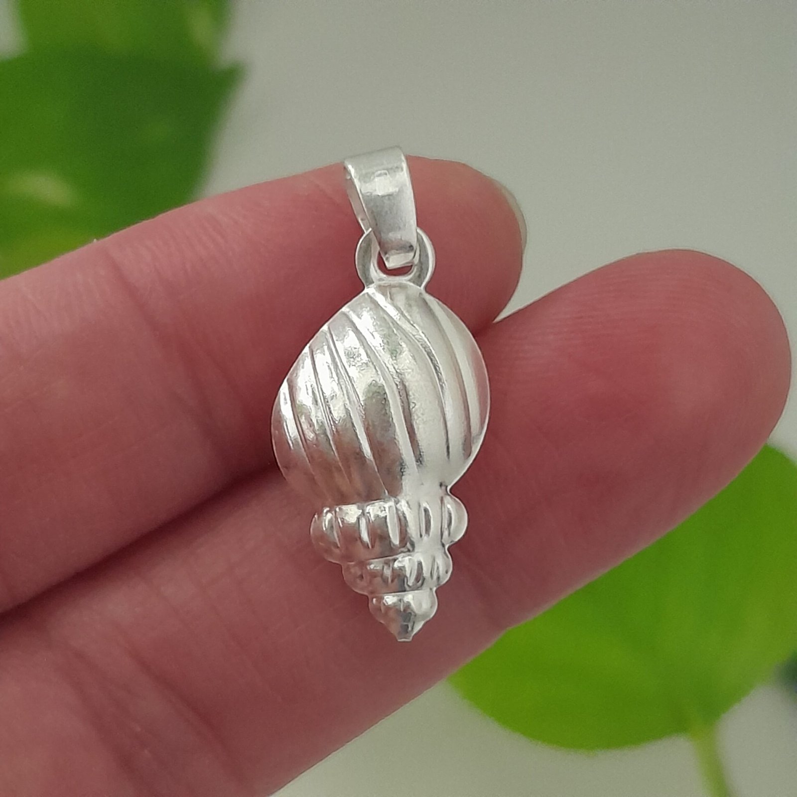 Dije mini caracol - Laminados