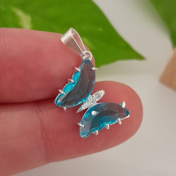 Dije mariposa cristal celeste - Laminados