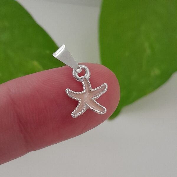 Dije estrella de mar esmaltado rosa - Laminados