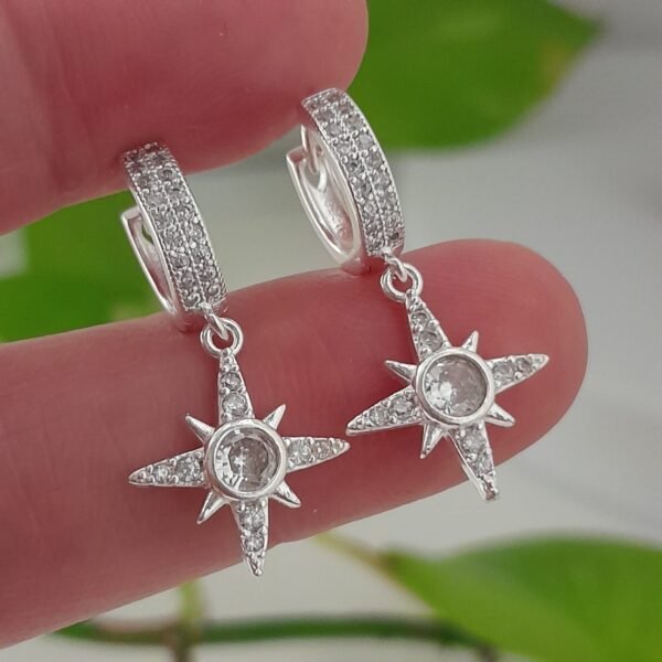 Aros huggies con brillo y estrellas polar – Laminados