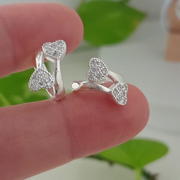 Aros huggies con brillo doble corazón – Laminados