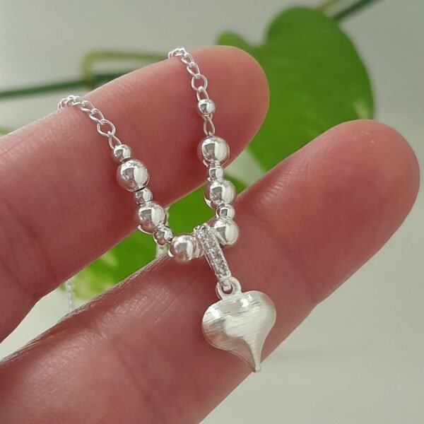 Conjunto cadena de bolitas degrade con dije corazón - Laminados