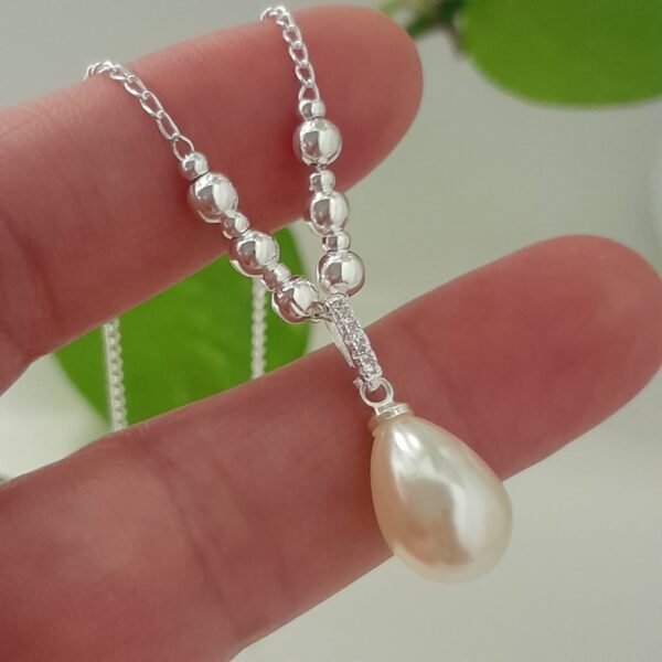 Conjunto cadena de bolitas degrade y dije perla – Laminados