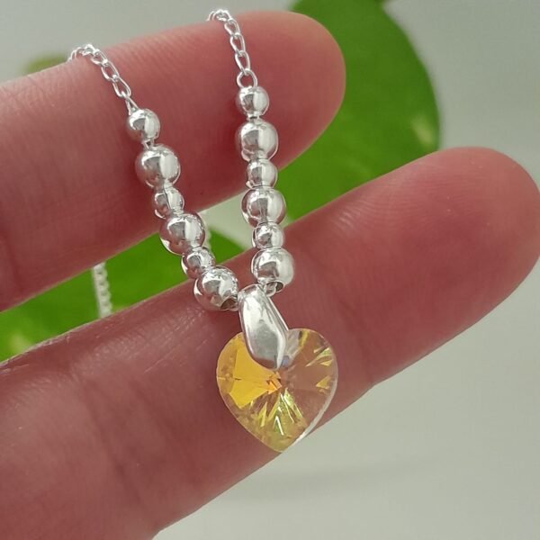 Conjunto cadena con bolitas degrade y dije corazón cristal swarovski amarillo – Laminados
