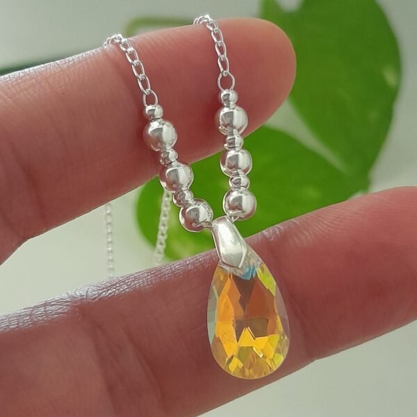 Conjunto cadena con bolitas degrade y dije gota cristal Swarovski amarillo – Laminados