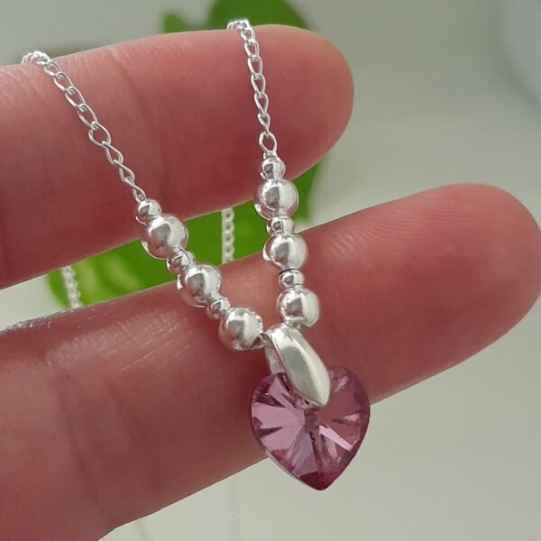Conjunto cadena con bolitas degrade y dije corazón cristal swarovski rosa – Laminados
