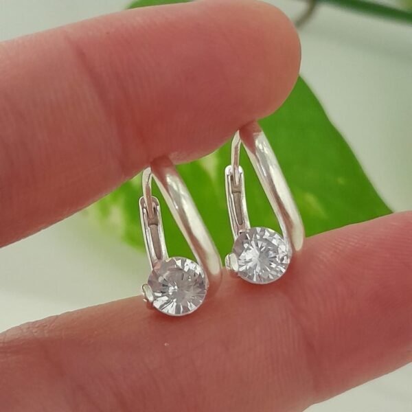 Aros huggies mini con brillo cristal central – Laminados