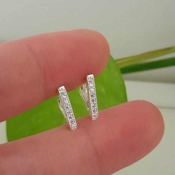 Aros huggies mini con brillo triangular – Laminados