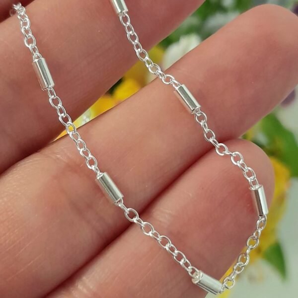 Cadena con tubos laminada