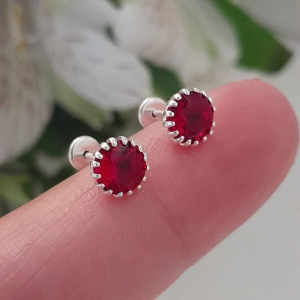 Abridor rojo circular engarzado