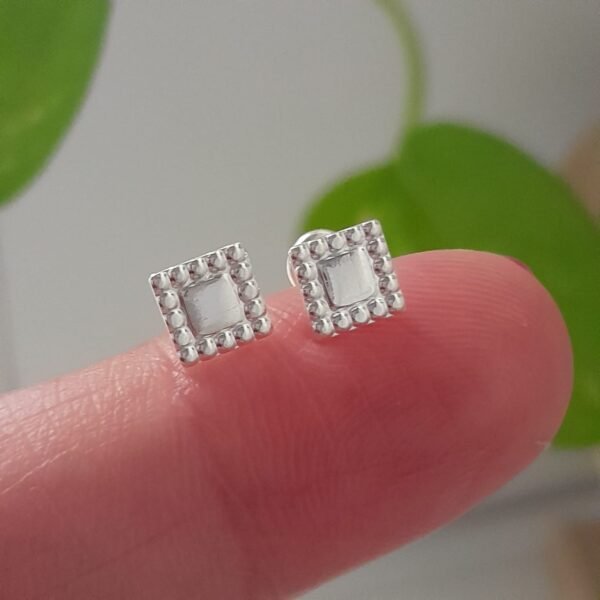 Abridor cuadrado-aro italiano