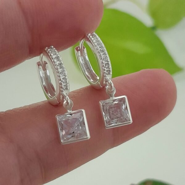 Huggies laminados cuadrado colgante con brillo