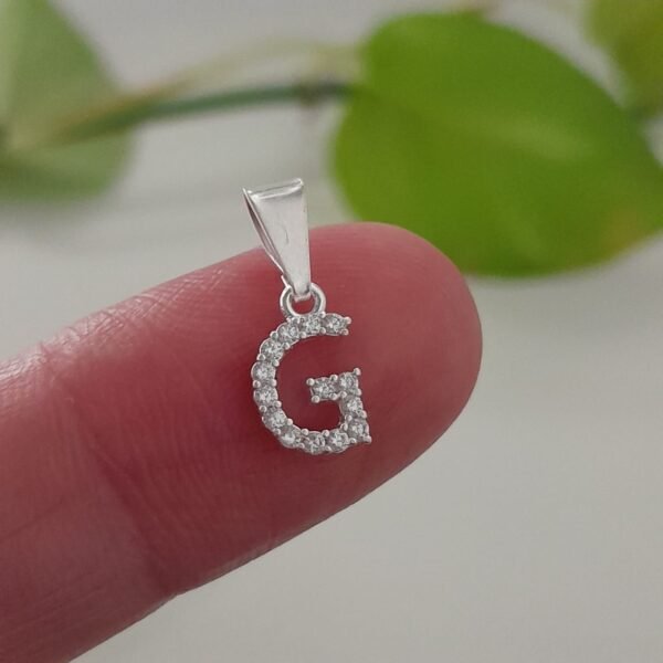 Inicial G laminada con brillo