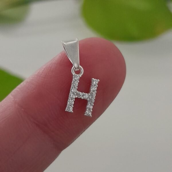 Inicial H laminada con brillo