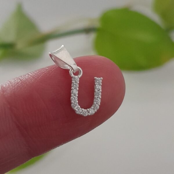 Inicial U laminada con brillo