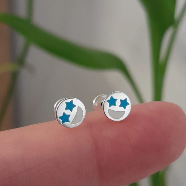 Abridor emoji con estrellas esmaltado