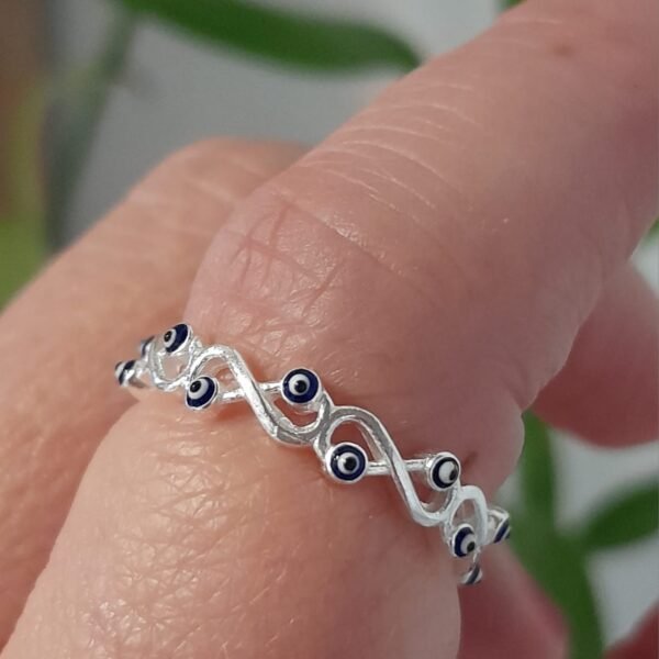 Anillo italiano con infinitos lisos y ojo turco