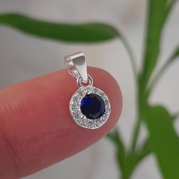 Dije italiano circular con cubic azul