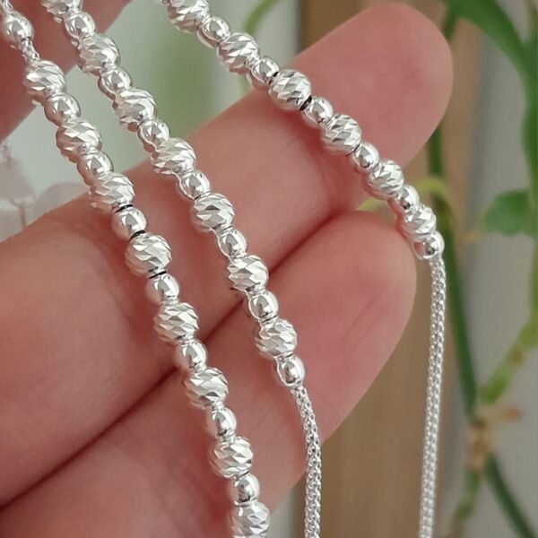 Pulsera italiana con bolitas caladas