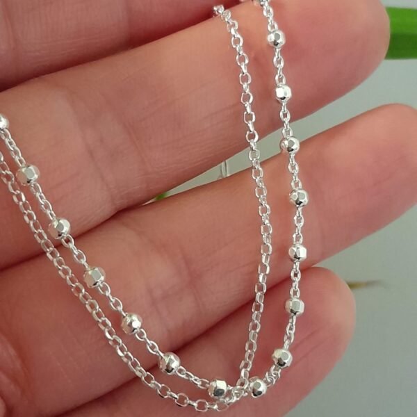 Pulsera italiana doble cadena con bolitas facetadas