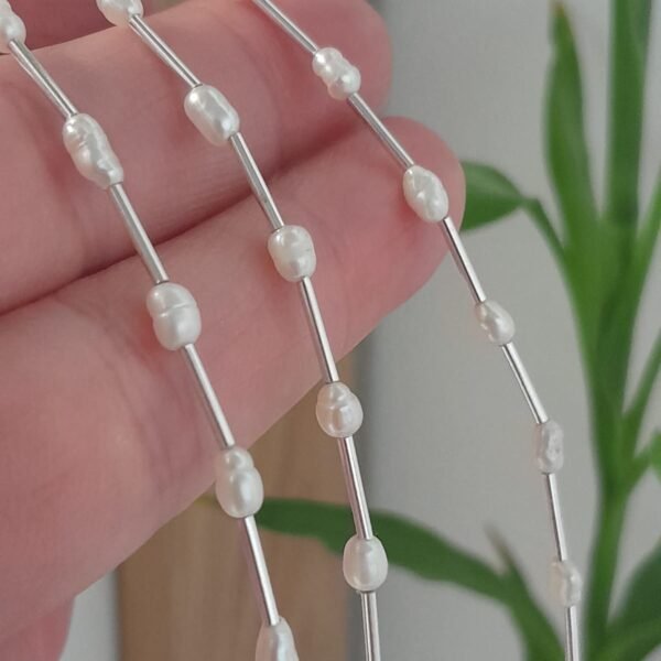 Pulsera con tubitos y perlas de rio